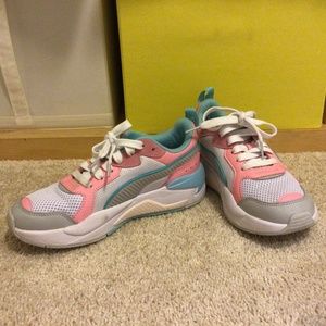 Pink, blue, and white kids puma gym shoes